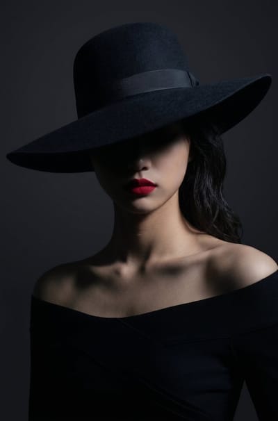 Shadowed Hat Fashion Portrait